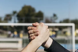 football-players-shaking-hands-_1_